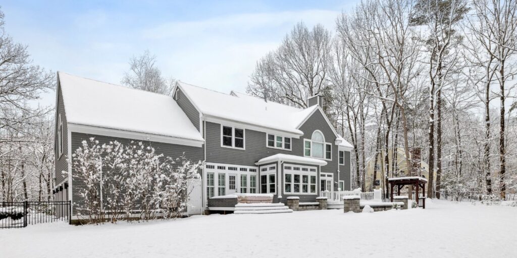 house with siding in winter
